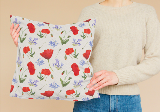 Square pillow with floral pattern Poppies and agapanthus in watercolor